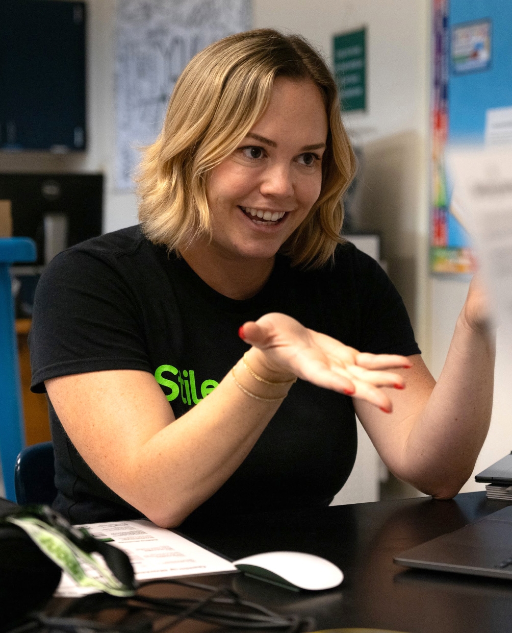 Stile support team member talk with teachers