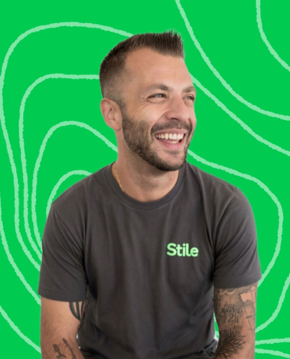 A Stile Teaching and Learning Specialist smiling in front of a green background with abstract line patterns.